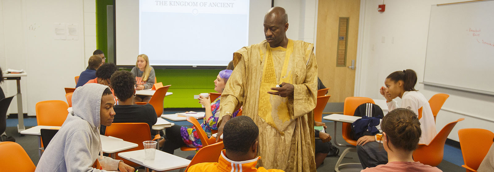 A lecturer speaks with his students at UT Knoxville